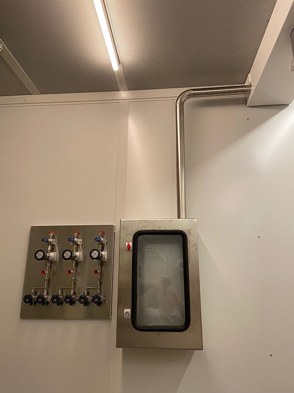 Small wall panel beside a service hatch