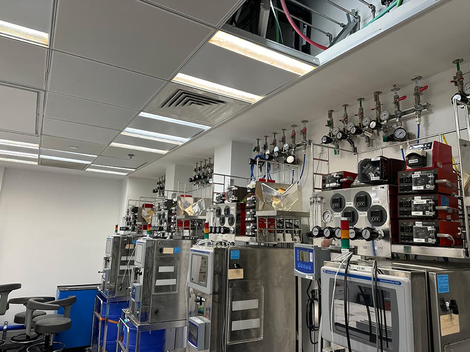 Laboratory hall with many instruments and gas drops
