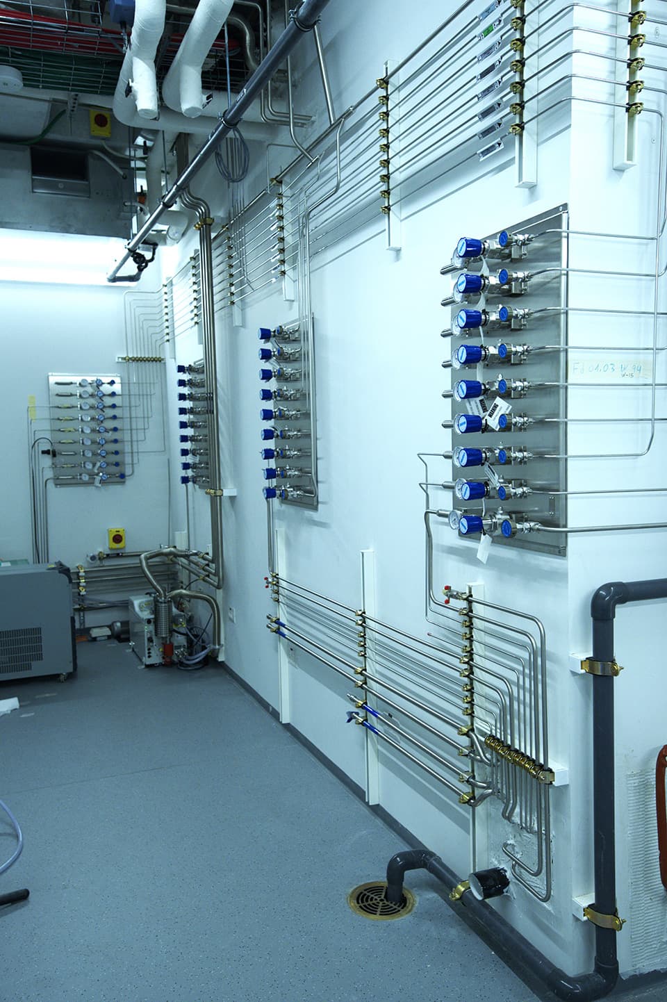 Blue-lit room with a panel array